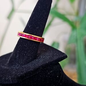 Ruby rhodium plated sterling silver eternity band